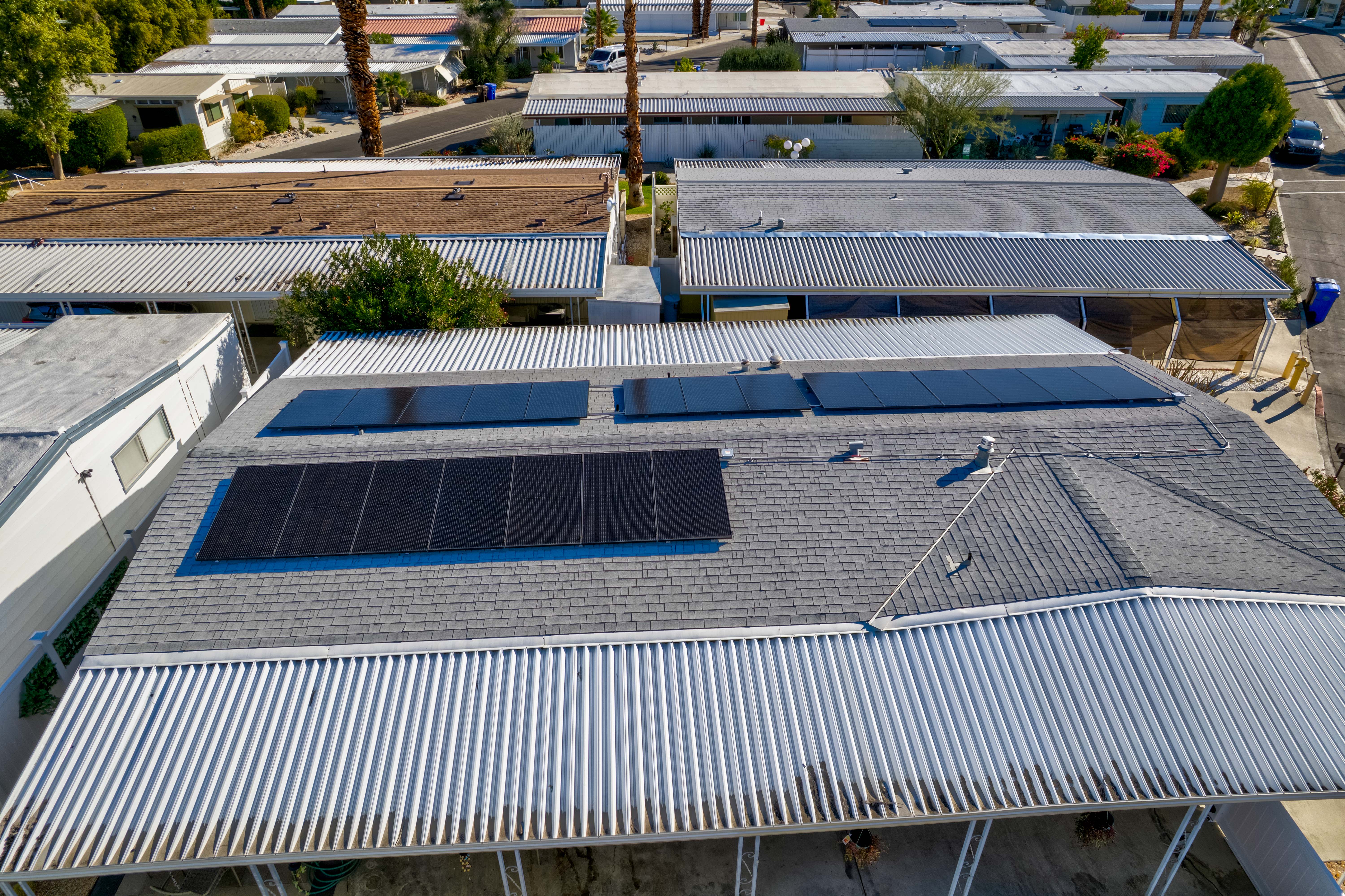 Solar panel installation on manufactured home roof in Southern California, showcasing energy-efficient solutions for mobile homeowners.