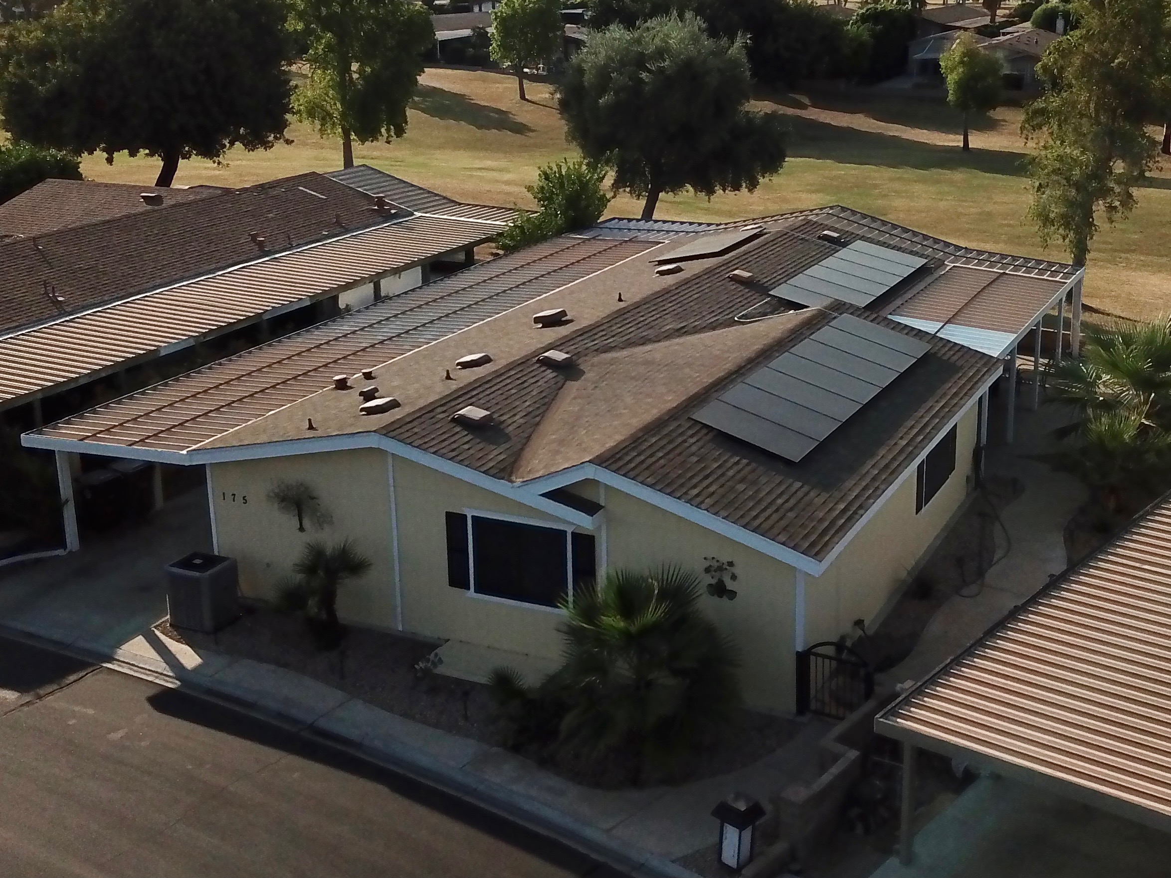 Solar panel installation on manufactured home in Southern California, showcasing rooftop panels and energy-efficient design.